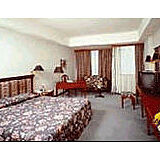 Tai-Pan Hotel — - Unit Bedroom