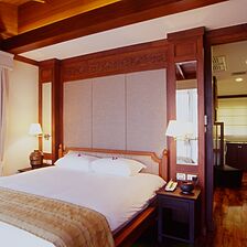 Q Signature Spa & Resort — Bedroom at the Samui Peninsula Spa & Resort
