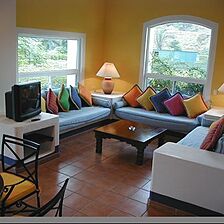 Amatique Bay Resort & Marina — Living Room at the
