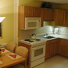 Destin Holiday Beach Resort — Kitchen and Dining Area