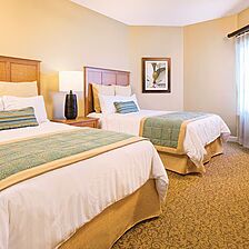 Club Wyndham SeaWatch Resort — Sample second bedroom with two full beds in larger deluxe suites.