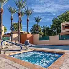 Club Wyndham Orange Tree Golf Resort — Accessible Hot Tub With Loungers and Umbrellas
