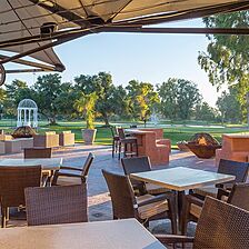 Club Wyndham Orange Tree Golf Resort — Waterfront Golf Course Patio and Dining Area With Firepits