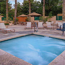 Club Wyndham Orange Tree Golf Resort — Accessible Hot Tub With Loungers and Umbrellas