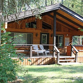 Glacier Wilderness Resort — Private hot tubs on a large covered front porch