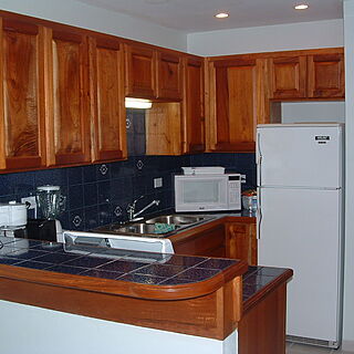 AquaMarina Suites — - Unit Kitchen