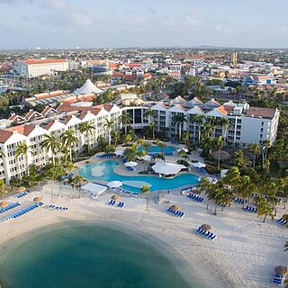 Renaissance Wind Creek Aruba - Ocean Suites — Exterior With Lagoon and Ocean View