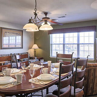 The Surrey Grand Crowne Resort and Country Club — Sample unit dining area