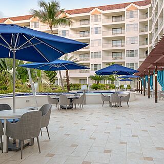 Marriott's Aruba Ocean Club — Patio with Shaded Tables