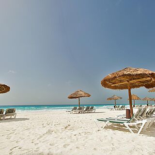 The Royal Sands — Resort Beach With Loungers and Cabanas