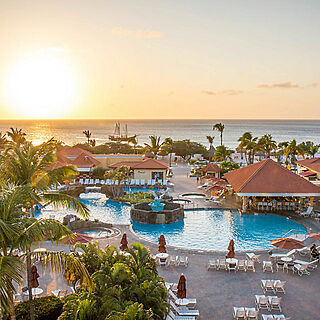 La Cabana Beach Resort — Pool Area With Loungers and Cabanas