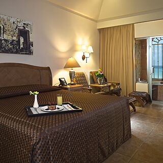 Royal Haciendas — Sample Bedroom With Attached Balcony