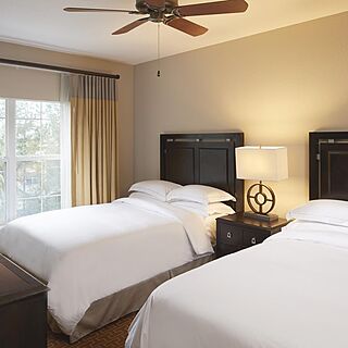 Hilton Grand Vacations at Tuscany Village — Sample Bedroom