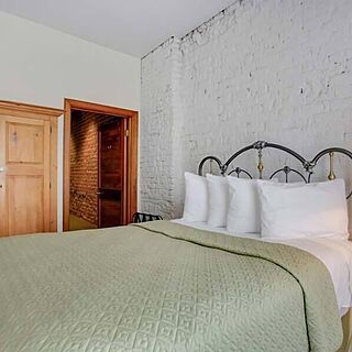 Hotel de L'Eau Vive — Sample Bedroom
