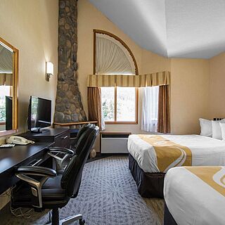 Chateau Canmore Quality Resort — Sample Bedroom