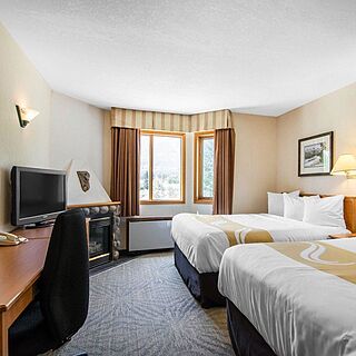 Chateau Canmore Quality Resort — Sample Bedroom