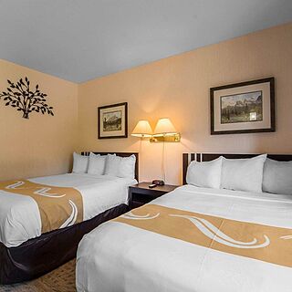 Chateau Canmore Quality Resort — Sample Bedroom
