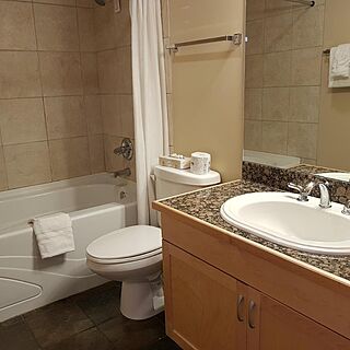 Sunset Resorts - Canmore — Sample Bathroom
