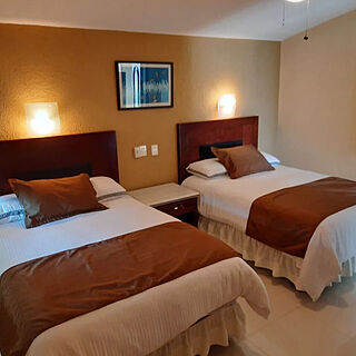 Suites Costa Dorada — Sample Bedroom