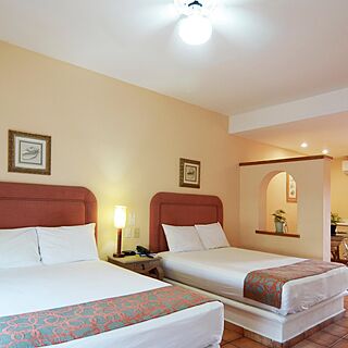 Suites Las Palmas — Sample Bedroom