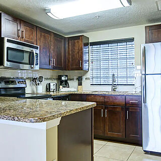 Summer Bay Orlando Resort — Sample kitchen in two-, three-, and four-bedroom units