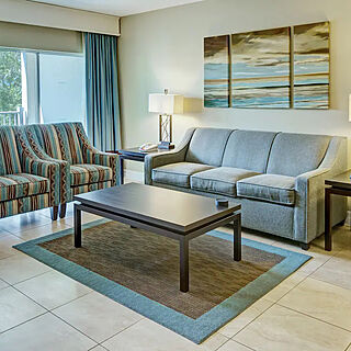 Summer Bay Orlando Resort — Living area in two-, three-, and four-bedroom units