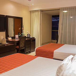 Sunset Plaza Beach Resort & Spa — Sample Bedroom