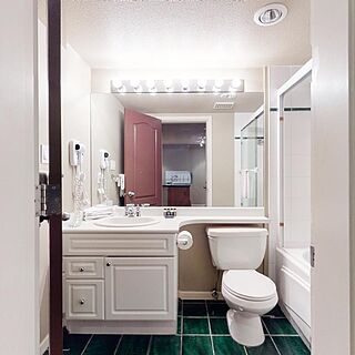 Town Plaza Suites — Sample Bathroom