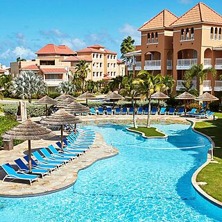 Divi Village Golf and Beach Resort &mdash; Pool Area With Umbrellas and Loungers