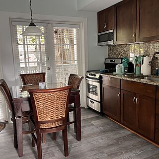 Kitchen and dining area looking toward back porch