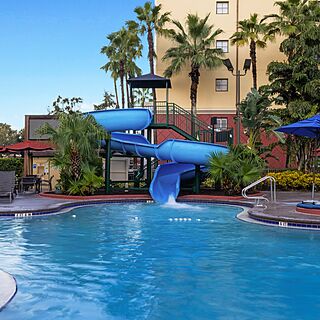 Club Wyndham Bonnet Creek Resort — Waterslide with Surrounding Loungers and Umbrellas