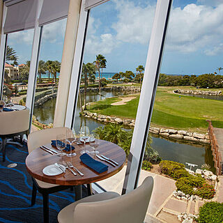 Divi Village Golf and Beach Resort &mdash; Resort Restaurant With Golf Course View