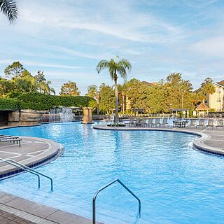 Sheraton Vistana Resort — Pool Area With Loungers and Umbrellas