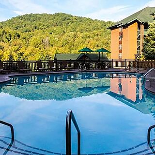 Westgate Smoky Mountain Resort & Water Park — Pool Area With Loungers and Umbrellas, and Mountain View