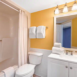 Ocean Club Resort Myrtle Beach, a Ramada by Wyndham — Sample bathroom