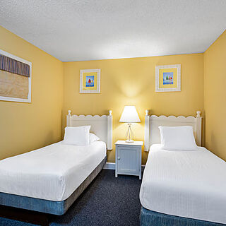 Ocean Club Resort Myrtle Beach, a Ramada by Wyndham — Sample bedroom