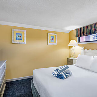Ocean Club Resort Myrtle Beach, a Ramada by Wyndham — Sample bedroom