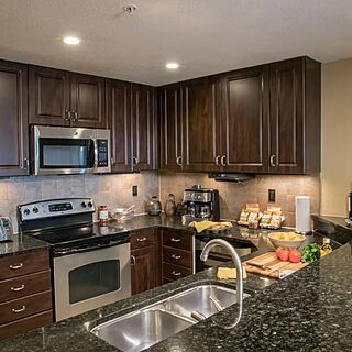 Holiday Inn Club Vacations at Orange Lake Resort - River Island — Sample four-bedroom Signature villa kitchen