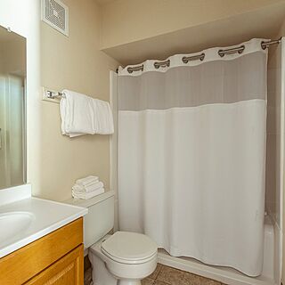 The Nautical Beachfront Resort — Sample bathroom