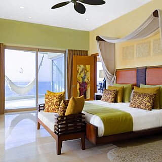 Garza Blanca Preserve Resort & Spa — Sample three-bedroom panoramic suite bedroom