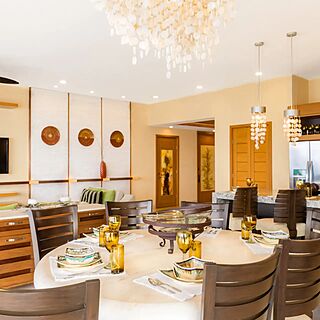 Garza Blanca Preserve Resort & Spa — Sample three-bedroom panoramic suite dining and living room