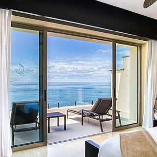 Garza Blanca Preserve Resort & Spa — Sample three-bedroom penthouse balcony